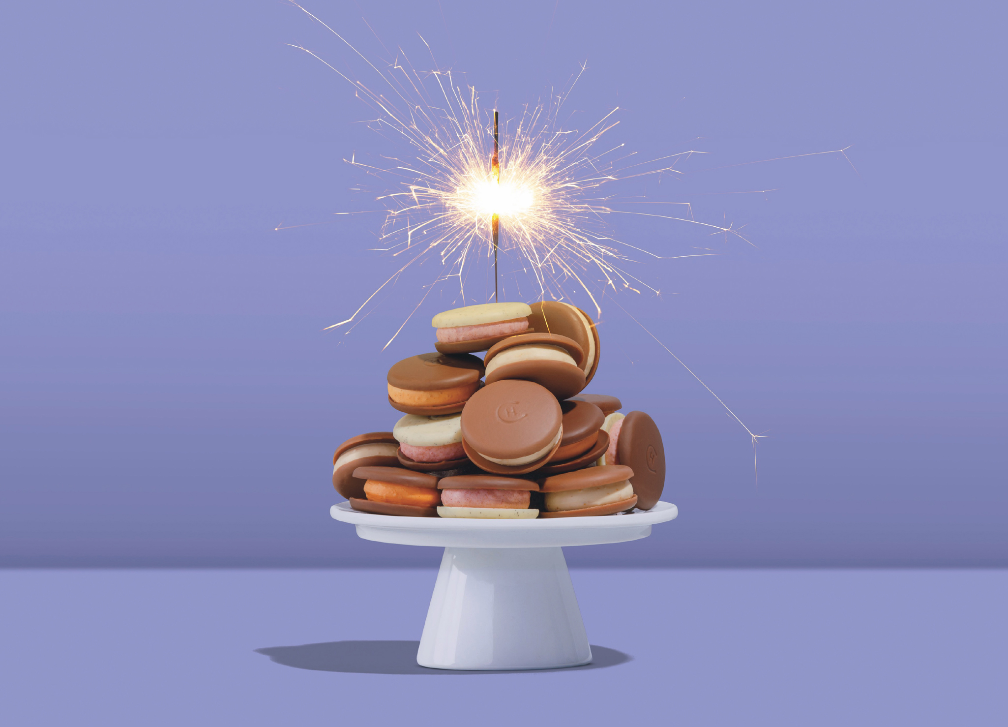 creative food photography - tower of chocolates with sparkler