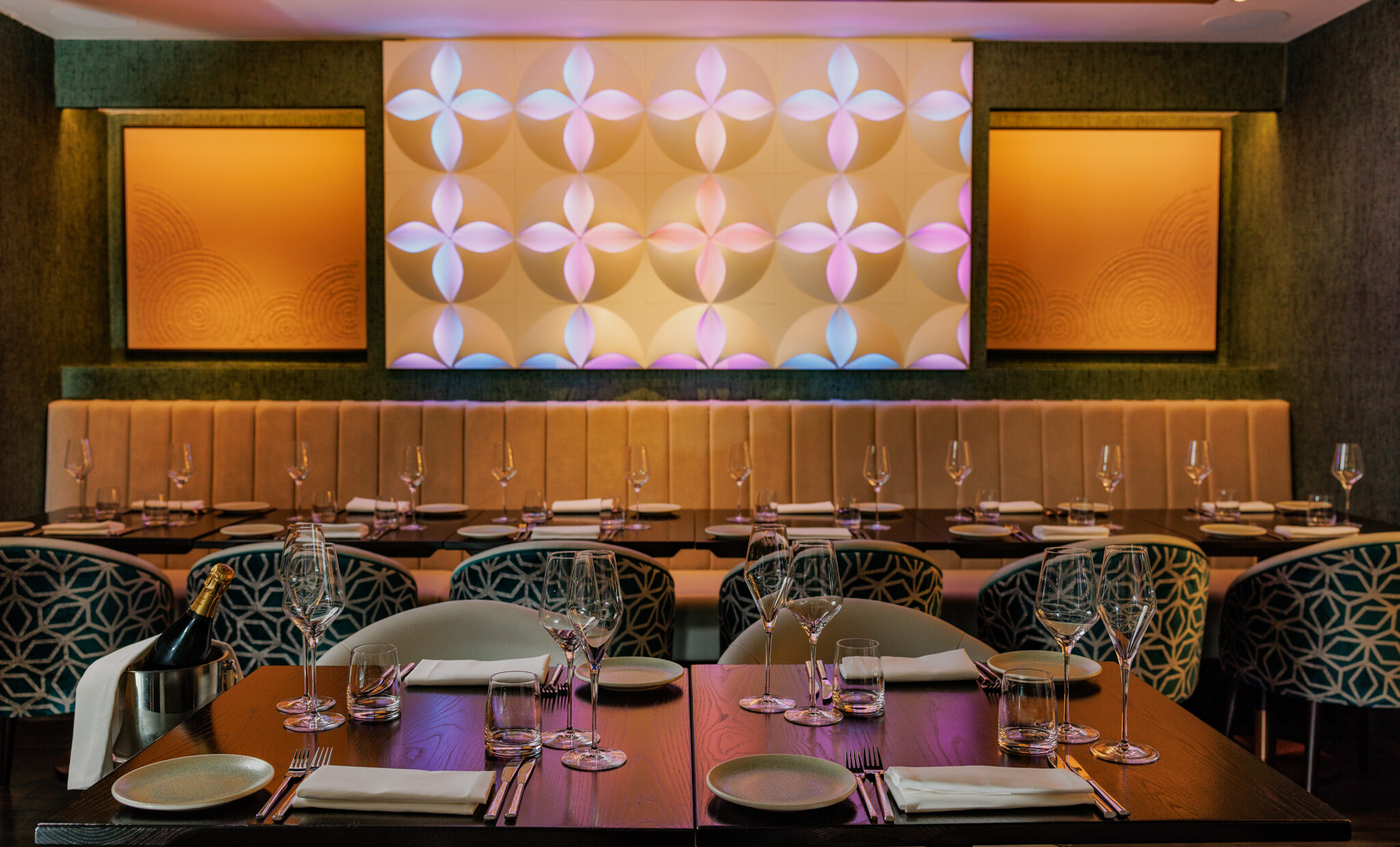 Interior of Pravaas Restaurant, South Kensington — View of the dining room featuring modern decor, ambient lighting and neatly set tables ready for service